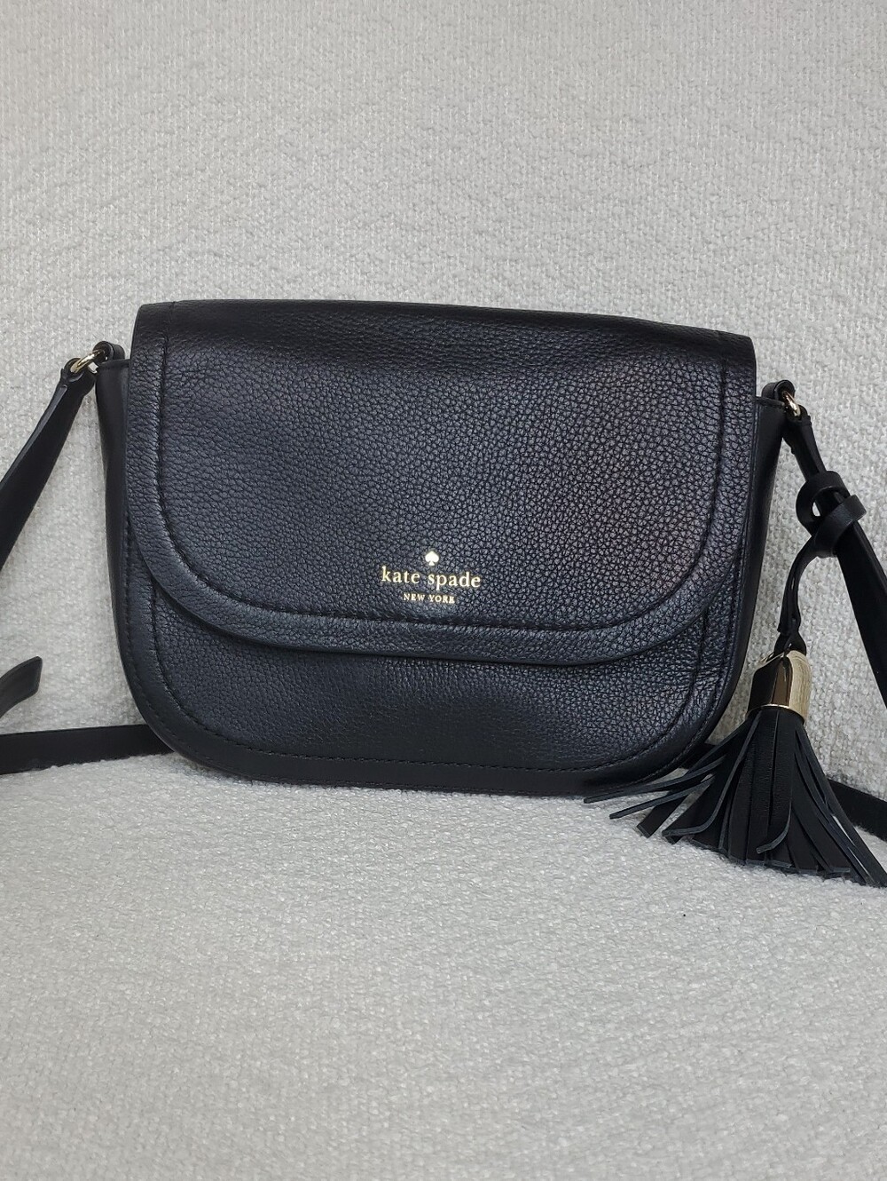kate spade Black Pebbled Leather Crossbody Bag with Tassel With Gold Accent